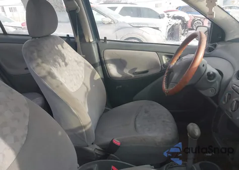 2000 Toyota Echo z USA, uszkodzony, nr VIN JTDBT1230Y0057047